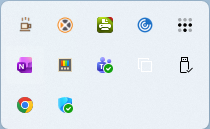 NudgeMug icon inside the Windows tray overflow menu.